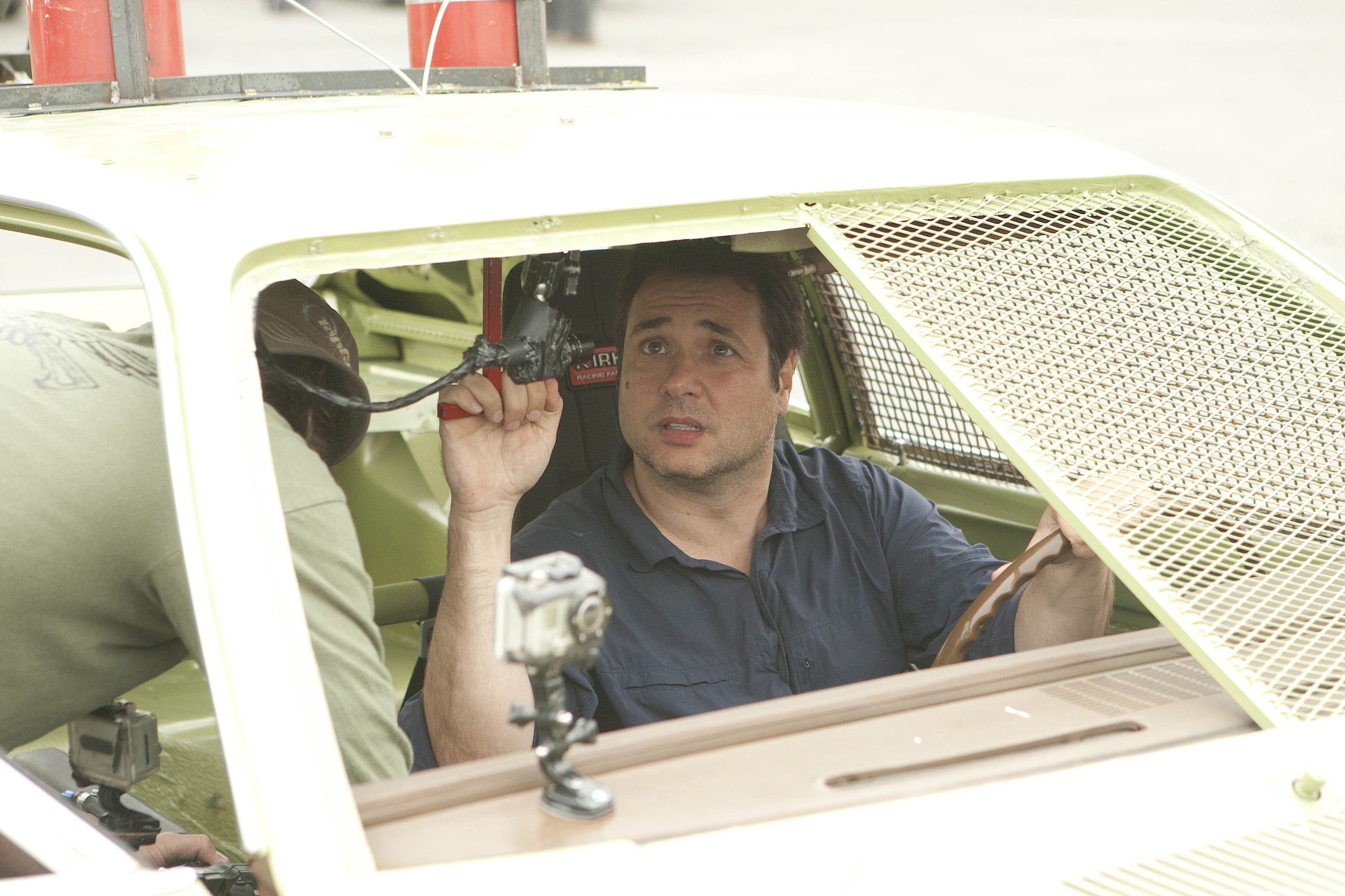 Adam gets set up to compete in a demolition derby. (Photo Credit: BBC Worldwide)
