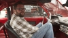 Rutledge sits inside his car before competing in a demolition derby. (Photo Credit: BBC Worldwide)