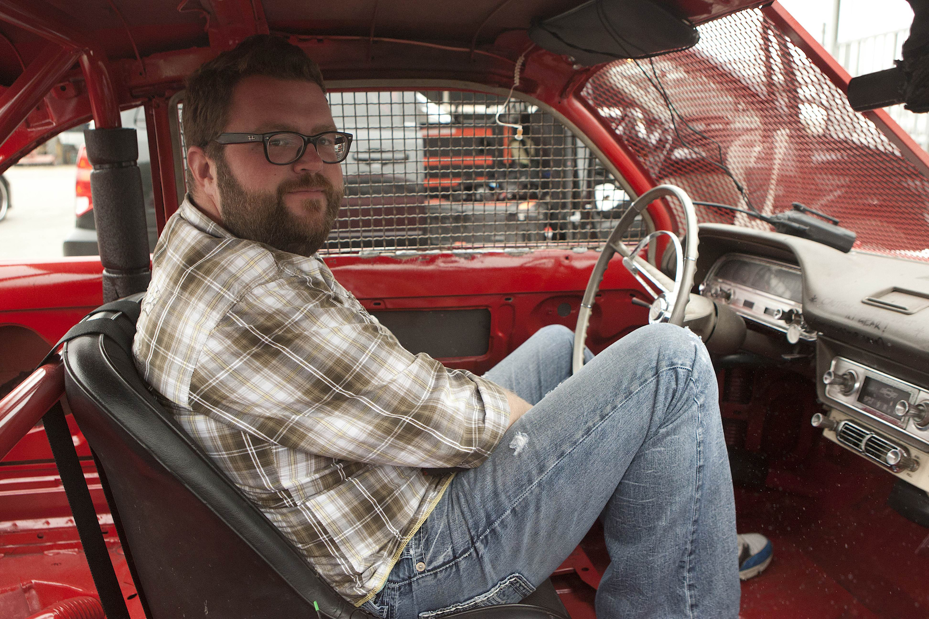 Rutledge sits inside his car before competing in a demolition derby. (Photo Credit: BBC Worldwide)