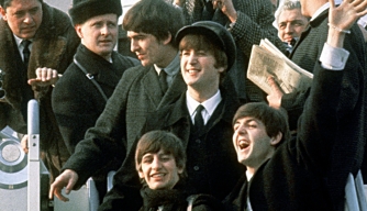 The Beatles arrive at New York's JFK airport on February 7, 1964. 