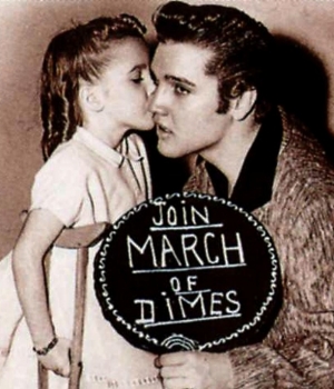 Elvis Presley makes an appearance in support of the March of Dimes, 1950s.