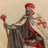 A soldier wearing the uniform of the order of the Knights Templar.