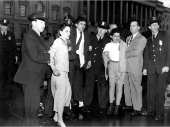 Lolita Lebron, Rafael Miranda and Andres Cordero being taken into custody following the attack.