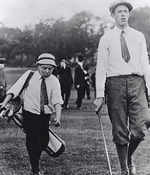 Francis Ouiment and caddy Eddie Lowery at the 1913 U.S. Open. (Credit: Ouiment College Scholarship Fund)