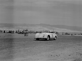 Actor James Dean (#23) rounds the first turn in his Porsche 356 Speedster at the 8th Palm Springs Road Race, March, 26-27, 1955. (Credit: Bob D'Olivo/Getty Images)
