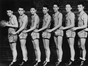 Fairmount High Quakers basketball player James Dean (second from left) poses for a portrait with his teammates in 1947. (Credit: Michael Ochs Archives/Getty Images)
