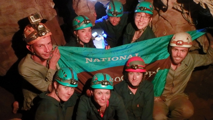 The "Underground Astronauts" pose with Rick Hunter and Steve Tucker, who discovered the Dinaledi Chamber. (Credit: Elizabeth Fitzgerald/National Geographic)