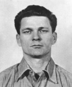 A police mug shot of American criminal Frank Lee Morris taken on his arrival at Alcatraz Federal Penitentiary, 20th January 1960. (Credit: Pictorial Parade/Getty Images)