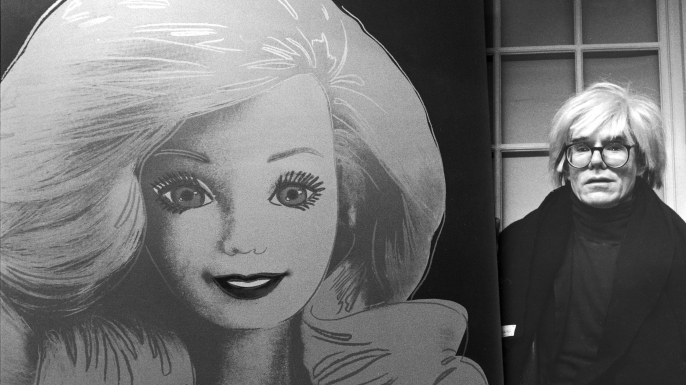 Artist Andy Warhol displaying his portrait of a Barbie doll. (Credit: DMI/The LIFE Picture Collection/Getty Images)