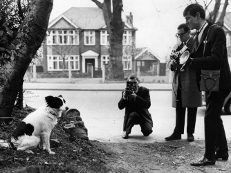 Pickles posing for photographers near the spot where he found the trophy. (Credit: Central Press/Getty Images)