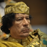 Muammar Qaddafi, the Libyan chief of state. (Credit: U.S. Navy)