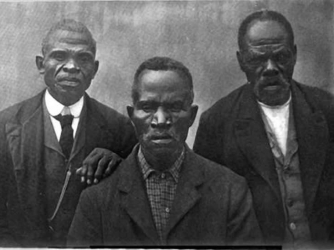 (From left to right) Romeo, Ward Lee, Tucker Henderson, were captured and brought to America on Wanderer. This picture was taken after they were freed.