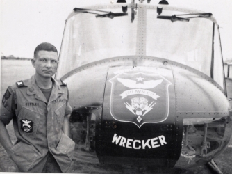 U.S. Army Maj. Charles Kettles, posing in front of a 121st Aviation Company UH-1H, during his second Vietnam tour of duty, 1969. (Credit: Retired U.S. Army Lt. Col. Charles Kettles)