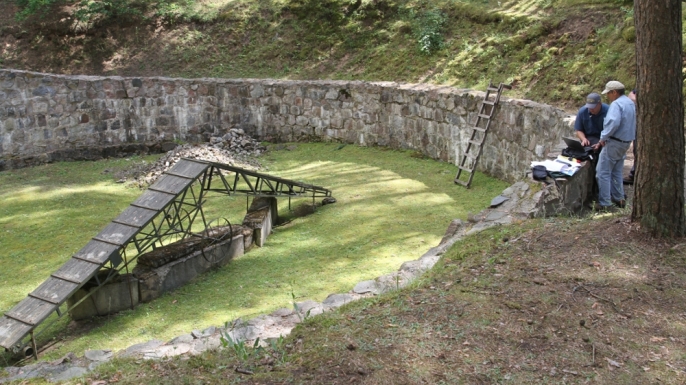 Researchers working at the holding pit site near Vilnius, Lithuania, holocaust, nazi party