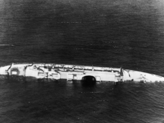 Andrea Doria, part of Italy's transatlantic liner fleet, now lies a battered wreck about 300 miles east of New York after colliding with the Swedish liner Stockholm. (Credit: Keystone/Getty Images)