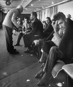 Promenade deck of French Liner le de France occupied by survivors of Andrea Doria. (Credit: Loomis Dean/The LIFE Picture Collection/Getty Images)