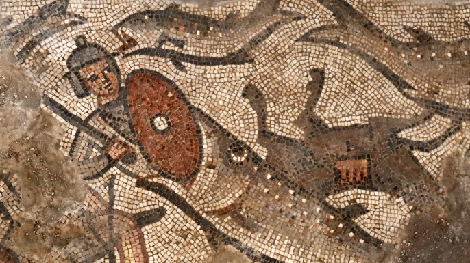 Portion of the mosaic depicting a fish swallowing a soldier during the parting of Red Sea. (Credit: Jim Haberman/Baylor University)