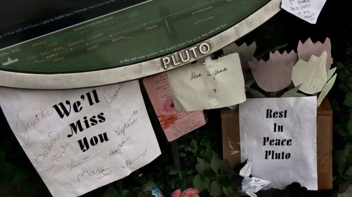 Rest in Peace signs for Pluto near the Smithsonian. (