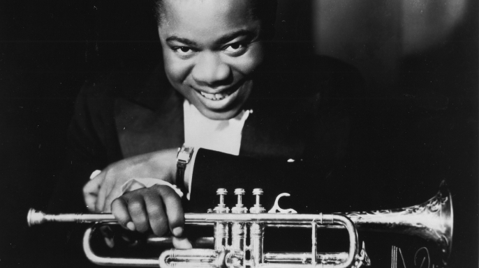 louis Armstrong with trumpet, late 1920s. (Credit: Gilles Petard/Redferns)