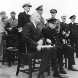 President Franklin D. Roosevelt (left) and Prime Minister Winston Churchill during Church services on the after deck of HMS Prince of Wales, during the Atlantic Charter Conference. (Credit: U.S. Navy)