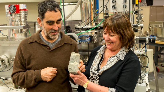 Allen Nutman (left) and Vickie Bennet (right) with a specimen of 3.7-billion-year-old stromatolites from Isua, Greenland.