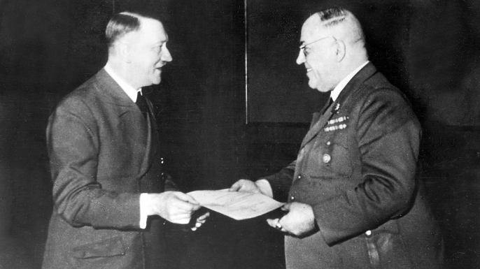 Hitler presents Morell the Knight's Cross, c. 1944. (Credit: Heinrich Hoffmann/ullstein bild via Getty Images)