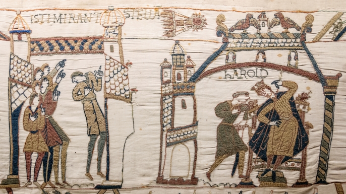 A scene from the Bayeux Tapestry, with Halley's Comet at the center.