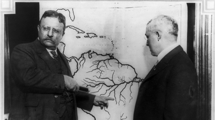Theodore Roosevelt pointing towards the area explored during the Roosevelt-Rondon expedition. (