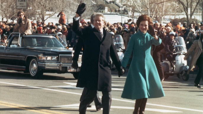 President Jimmy Carter and first lady Rosalynn Carter walk from the Capitol to the White House during his inauguration parade.
