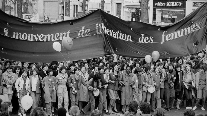 A group of French demonstrators marching under the banner of the Movement for the Liberation of Women (MLF) on International Women's day, 1981. (Credit: Keystone-France/Gamma-Keystone via Getty Images)