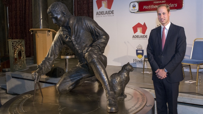 Prince William, Duke of Cambridge unveils a statue in honor of Captain Matthew Flinders. (Credit: Arthur Edwards/Getty Images)