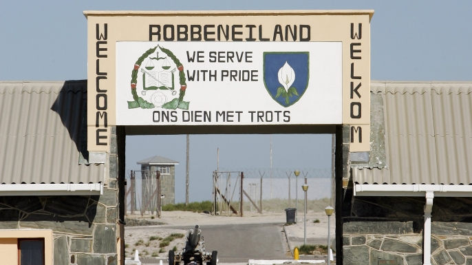 The main gate welcomes on Robben Island near Cape Town, South Africa. (Credit: Brian Bahr/Getty Images)