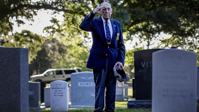 Lt. Col. Richard Cole visits the grave site of Lt. Col. Jimmy Doolittle at Arlington National Cemetery on May 23, 2014.