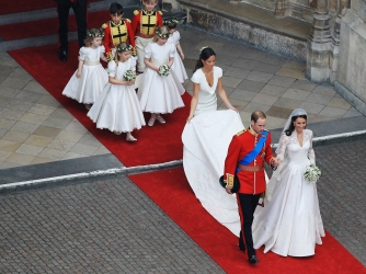Their Royal Highnesses Prince William, Duke of Cambridge and Catherine, Duchess of Cambridge following their marriage at Westminster Abbey on April 29, 2011. (Credit: Dave Cannon/GP/Getty Images)