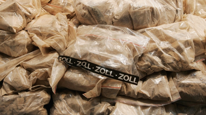Munich police display 120 kilos of heroin that was seized from Turkish smugglers. (Credit: Jan Pitman/Getty Images)