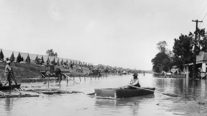 Refugees tents were pitched on the levee after almost the entire town of Greenville, Mississippi has been submerged by the Mississippi waters, making it the worst flood in the history of the United States. (Credit: Bettmann/Getty Images)