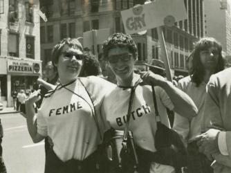 Nancy Tucker and partner in Butch-Femme t-shirts in 1st Christopher St Liberation Day Parade in NYC, 1970. (Credit: NYPL)