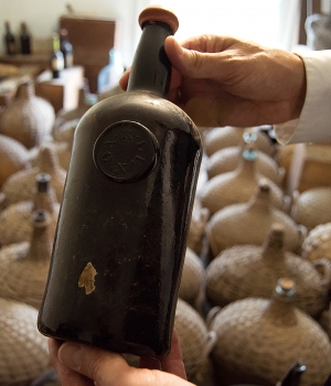 A six-month restoration project at Liberty Hall Museum in Union, N.J., uncovered three cases of Madeira wine dating to 1796 and about 42 demijohns from the 1820s while restoring its wine cellar. (Credit: David J. Del Grande/NJ Advance Media via AP)