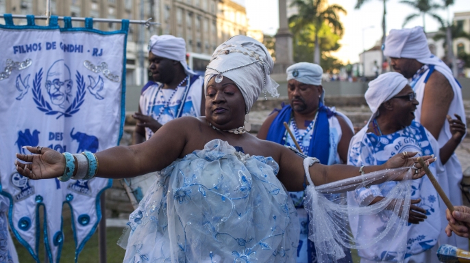 People celebrate after Valongo Wharf was added to the list of UNESCO World Heritage sites, in Rio de Janeiro, Brazil. The committee of the UN cultural body, meeting in Krakow, Poland, said Valongo was a reminder of an estimated 900,000 African slaves who were brought there by traders starting in 1811.(Credit: Maruo Pimentel/AFP/Getty Images)