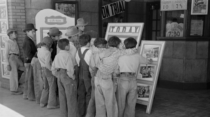 Children in front of a movie theater in Alpine, Texas, 1939. (Credit: Universal History Archive/UIG via Getty Images)