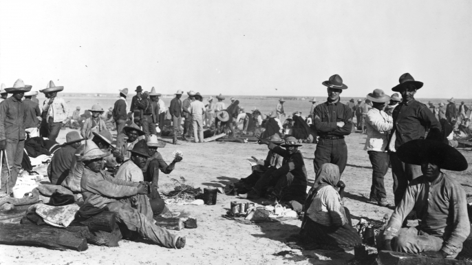 Refugees from Mexico at a camp on the desert in Fort Bliss, Texas during the Mexican Revolution. (Credit: OTA/Library of Congress/Corbis/VCG via Getty Images)