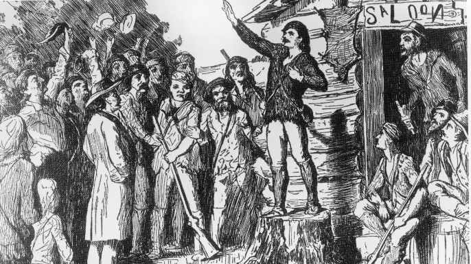 Illustration of Davy Crockett campaigning for the House of Representatives to a group of people, circa 1800s. (Credit: Fotosearch/Getty Images).