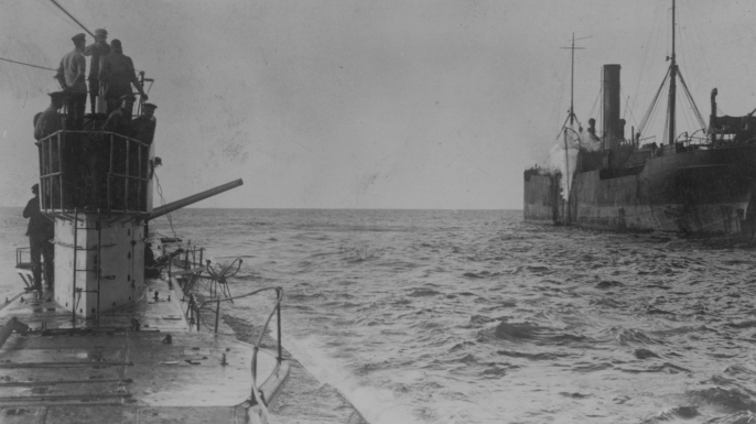 U-boat opening fire with a deck cannon, upon an allied merchant ship, circa 1915. (Credit: Hulton Archive/Getty Images)