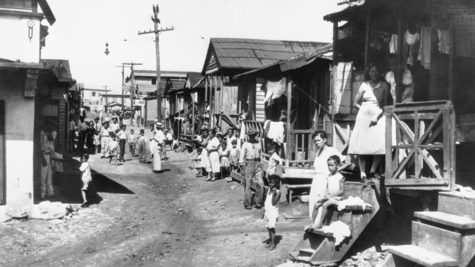 "La Perla," one of the worst slums in San Juan, and which was thoroughly inspected by Mrs. Franklin D. Roosevelt touring the last phase of her economic survey in the West Indies. (Credit: Bettmann/Getty Images)