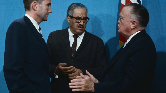 FBI Director J. Edgar Hoover, Supreme Court Justice Designate Thurgood Marshall, and Attorney General Ramsey Clark at the White House as President Johnson addressed member of the National Council on Crime and Delinquency, 1967. (Credit: Bettmann/Getty Images)