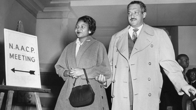 Autherine Lucy and Thurgood Marshall, her lawyer, entering the NAACP office for a press conference. (Credit: Al Pucci/NY Daily News Archive via Getty Images)