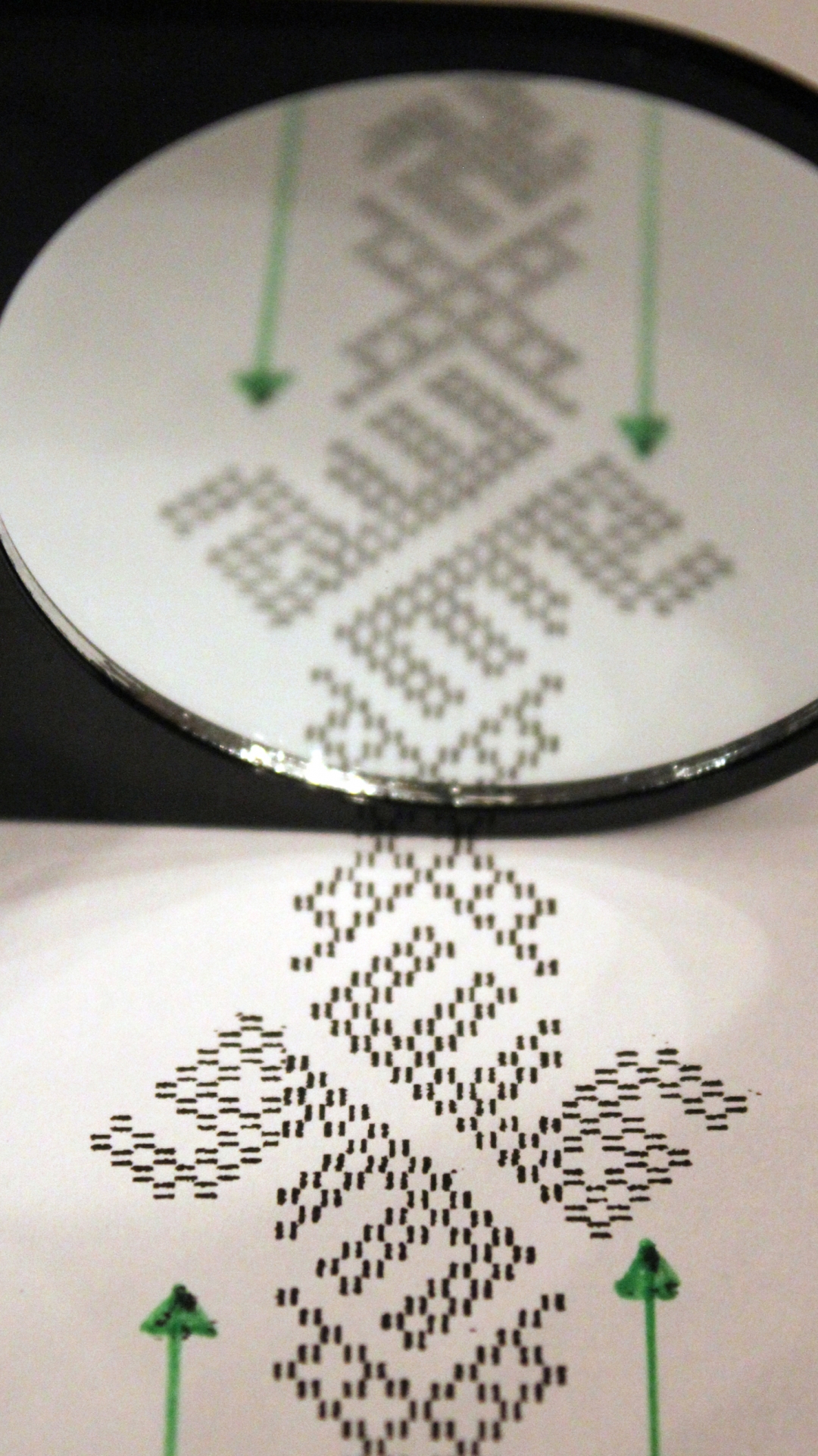 An enlarged print of the woven band's pattern reveals "Allah" in it's reflection. (Credit: Annika Larsson)