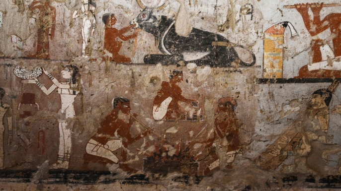 Well-preserved and rare wall paintings inside the tomb of an Old Kingdom priestess on the Giza plateau on the outskirts of Cairo, that was unveiled on February 3, 2018, after being discovered during excavation work in Giza's western cemetery by a team of Egyptian archaeologists. (Credit: Mohamed El-Shahed/AFP/Getty Images)