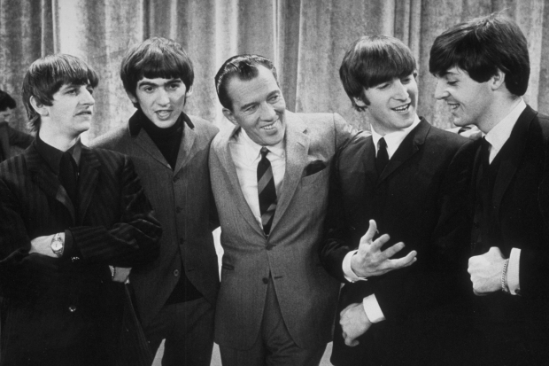 The Beatles with Ed Sullivan, February 9, 1964. (Getty)