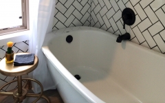 Tiny House bathroom with tub.